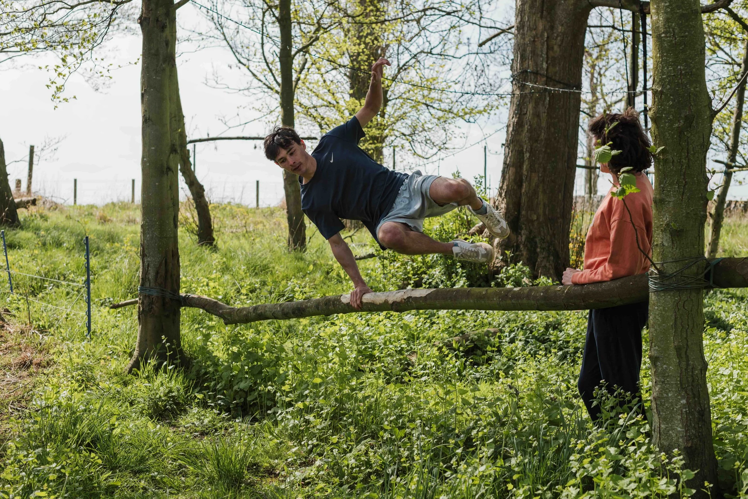 Person engaged in peaceful daily movement practice outdoors